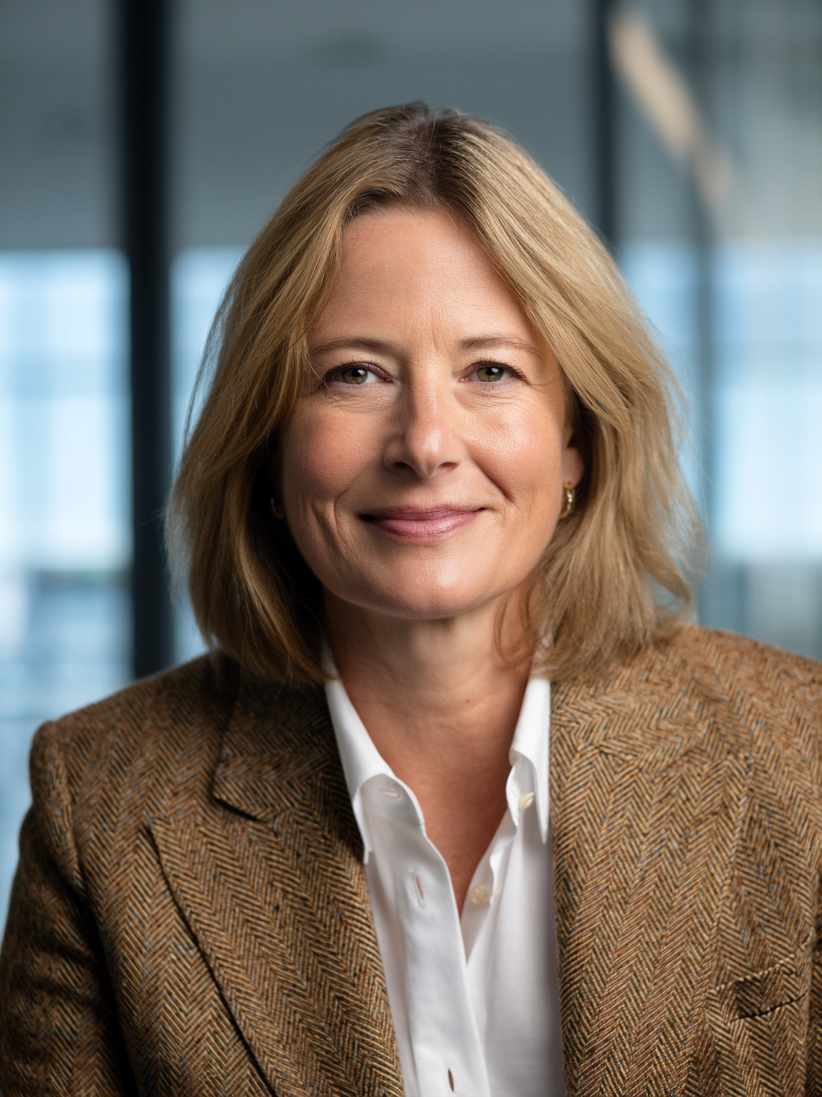 Professional female headshot example — corporate