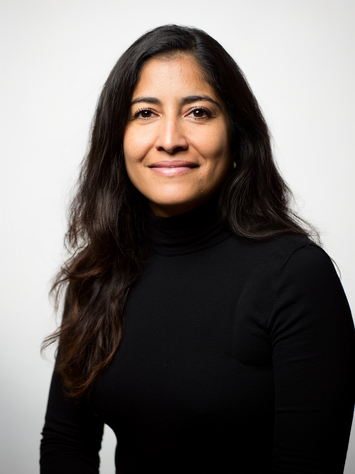 Professional female headshot example — editorial